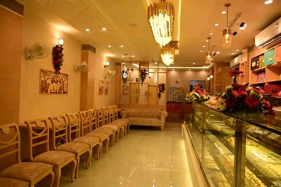 Kanhaiya Sweets elegant shop interior with seating